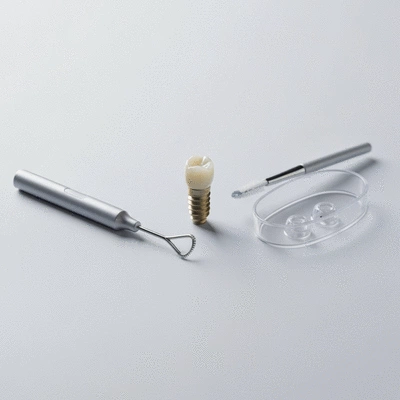 Dental implant care items on a clean counter: toothbrush, mouthwash, soft food
