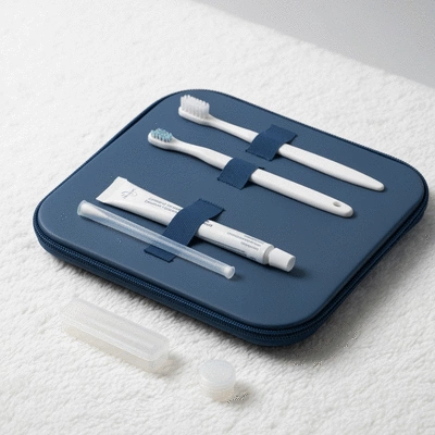 Recovery kit with ice pack, soft foods, and medication on a table